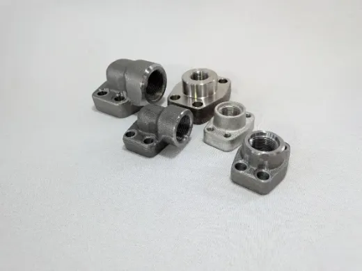 Pipe threaded flanges